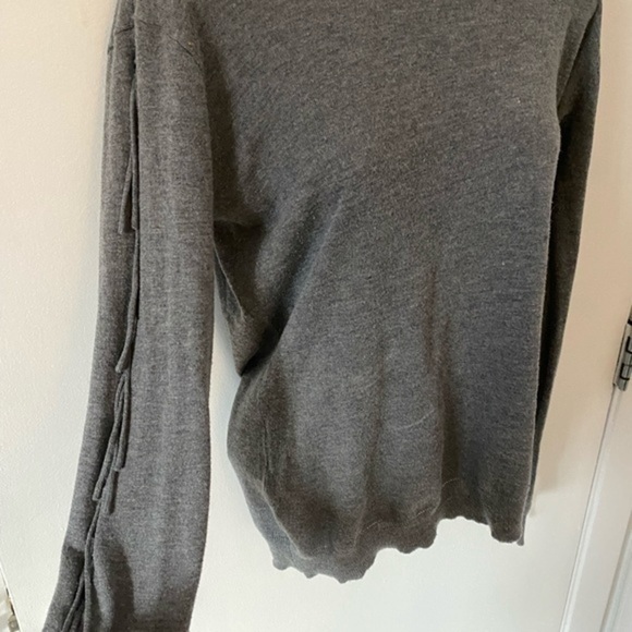 Candela light grey sweater with fringe ties down the sleeves - Picture 5 of 6